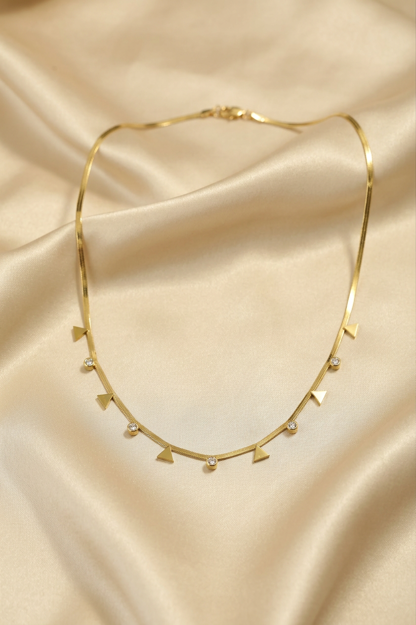 Gold Tone Premium Crystal Charms Snake Chain Necklace with Traingular Accents for Women - Glossy Finish