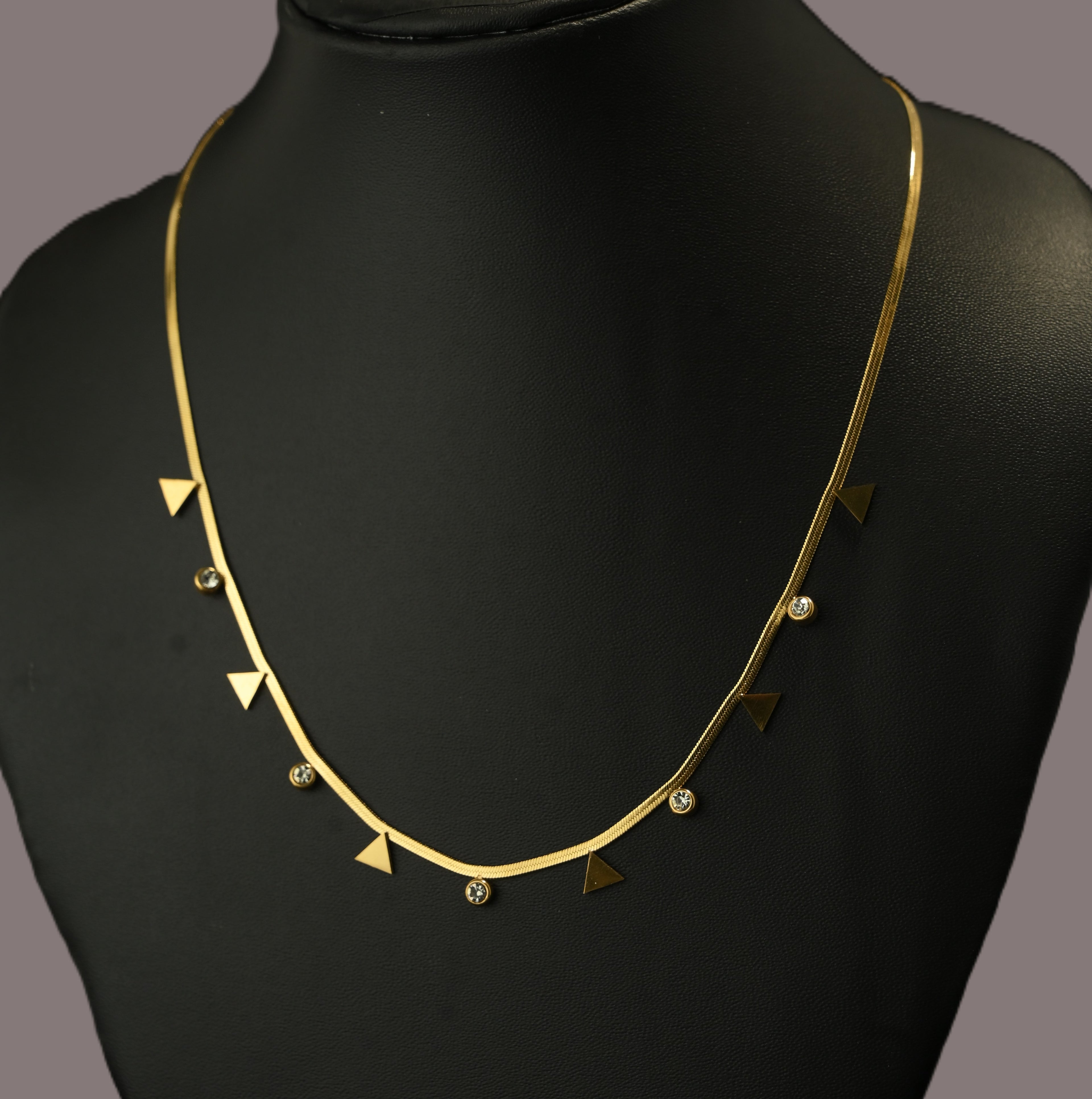 Gold Tone Premium Crystal Charms Snake Chain Necklace with Traingular Accents for Women - Glossy Finish