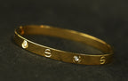 Gold Tone Classic Screw Detail Crystal Bangle Bracelet for Women- Glossy Finish (Baby Size)