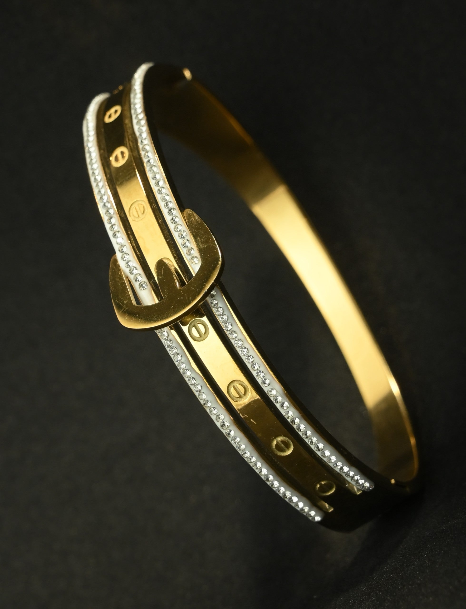 Gold Tone Stylish Buckle Detail Bangle Bracelet with Studded Zirconia for Women - Glossy Finish