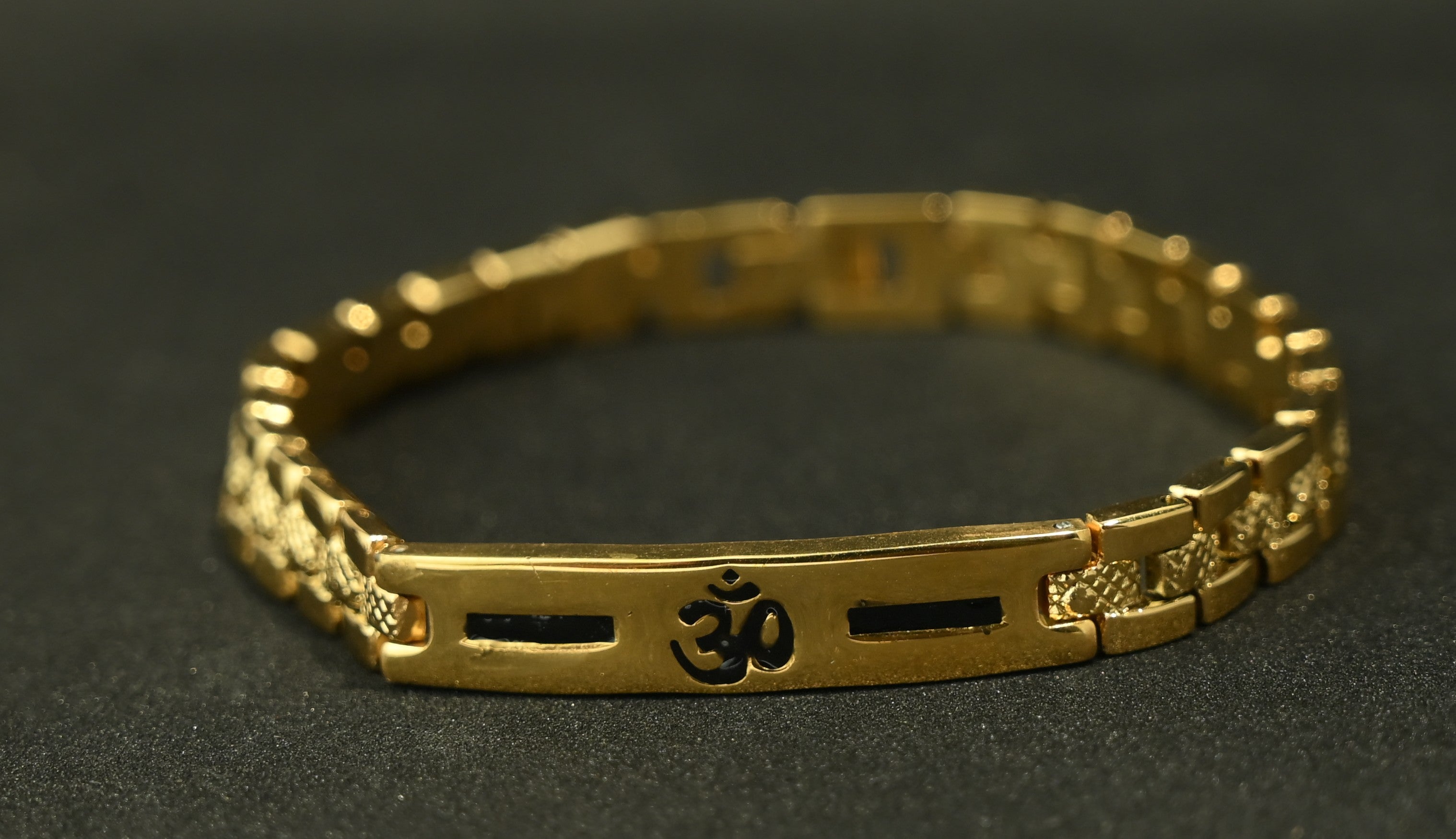 Gold Tone Elegant Om Black Accent Bracelet for Men- Glossy Finish (8 Inch)