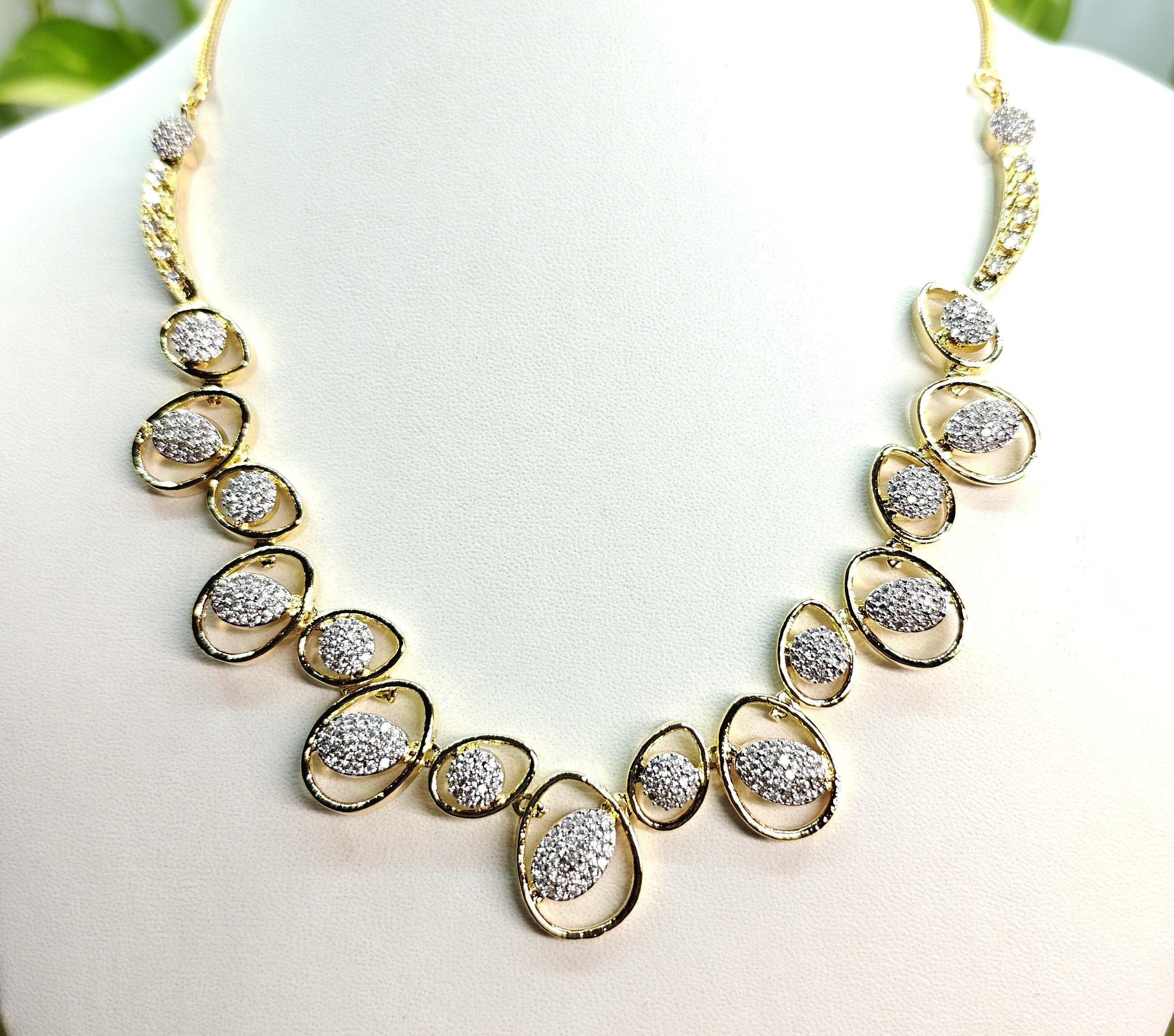 AD Gold-Plated Oval Motif Indo-Western Style Necklace Set for Women