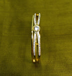 Gold-Plated Solitaire Stone-Studded Criss-Cross Pattern Cuff Bracelet for Women - Glossy Finish / Openable Medium