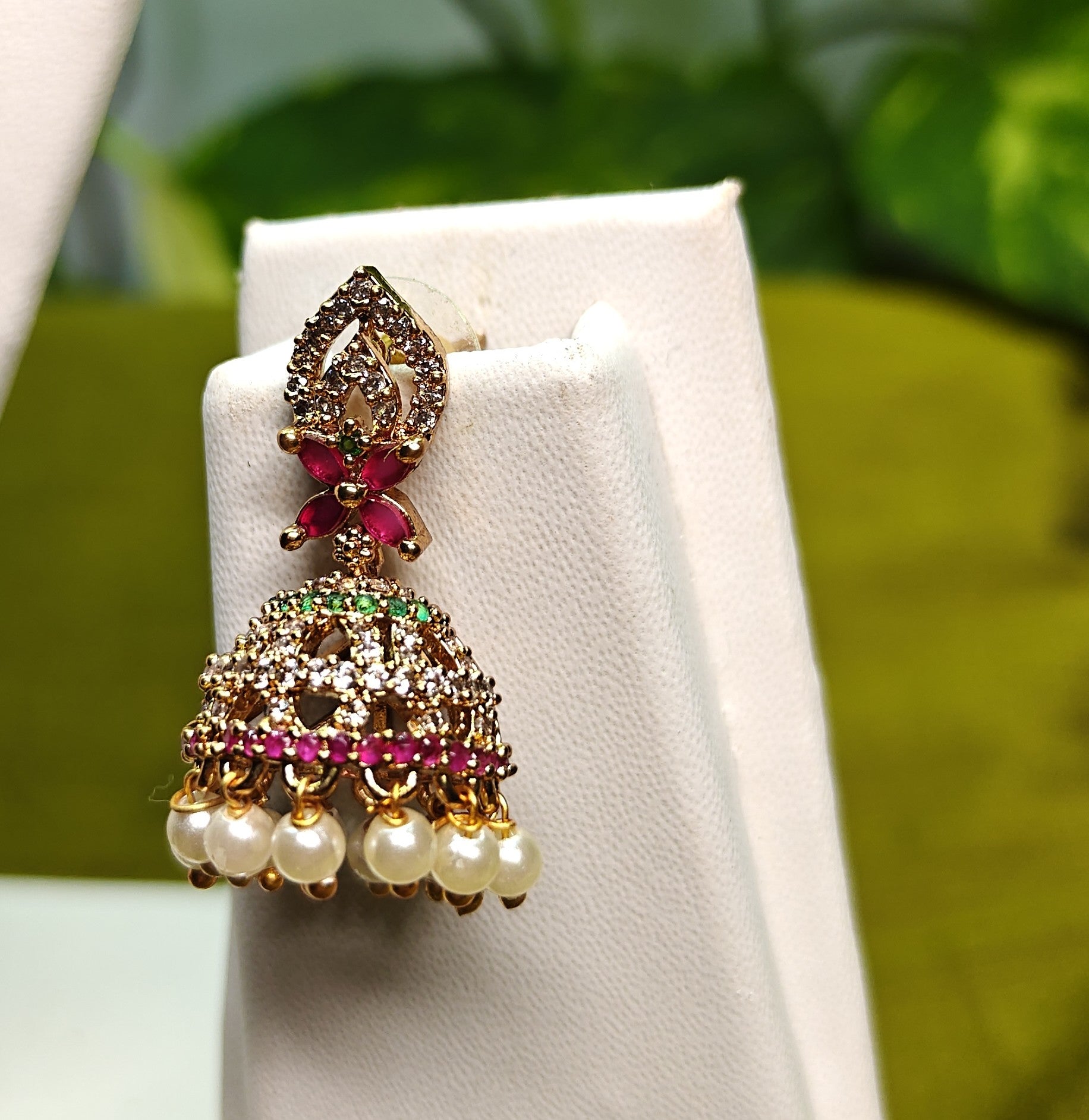 Gold-Tone Leaf Top Style AD Stone Jhumka with Pearl Drops for Women - Matte Finish