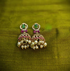 Gold-Tone Green Stone AD Jhumka with Oval Top for Women - Matte Finish