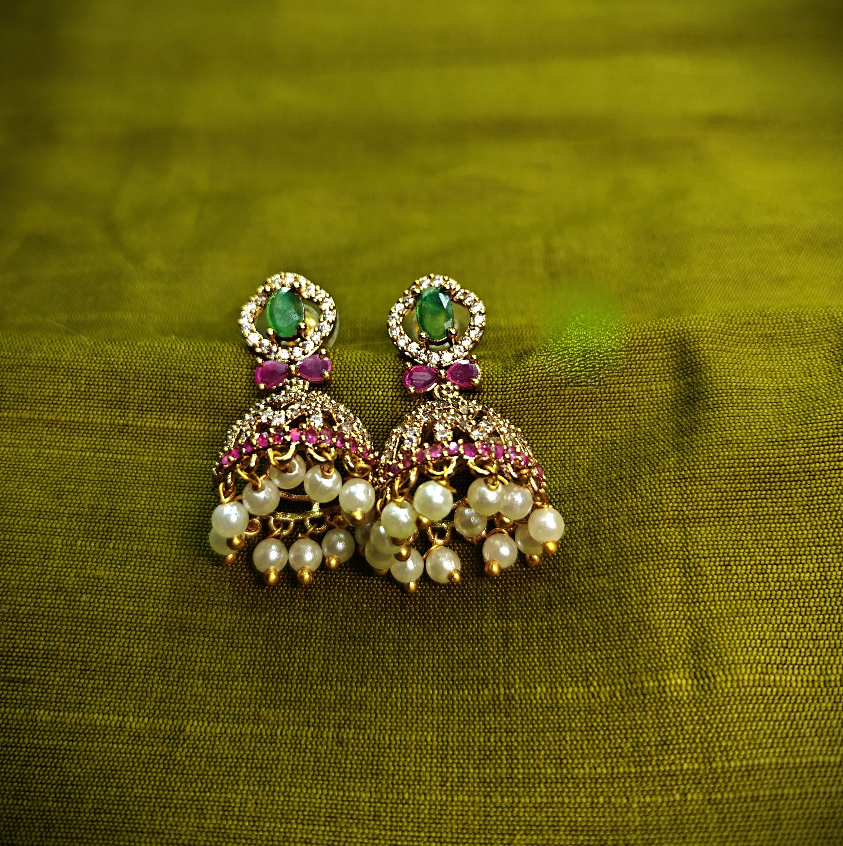 Gold-Tone Green Stone AD Jhumka with Oval Top for Women - Matte Finish