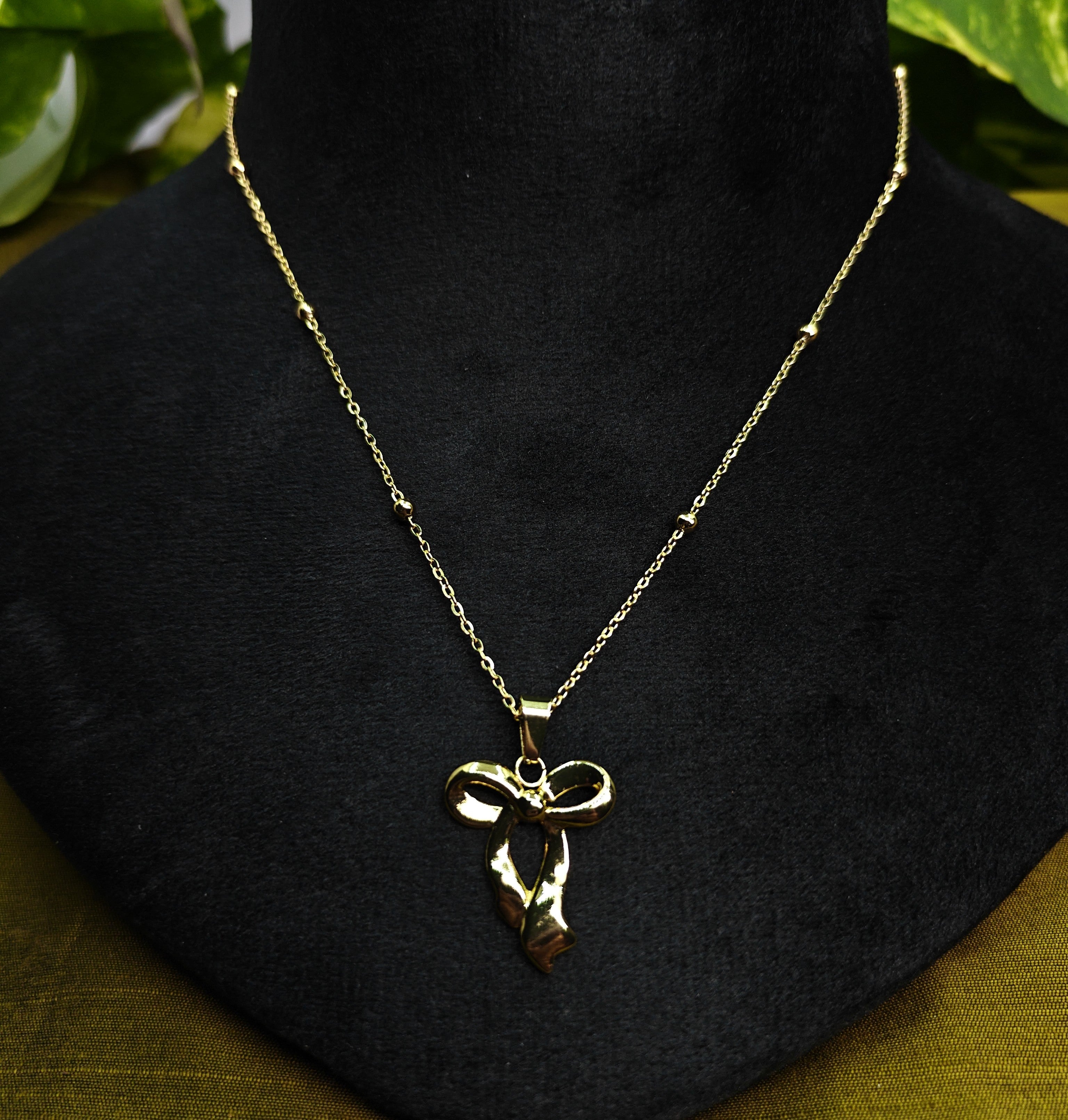 Gold-Tone Bow Pendant Stainless Steel Necklace for Women - Glossy Finish (21.5 Inches)