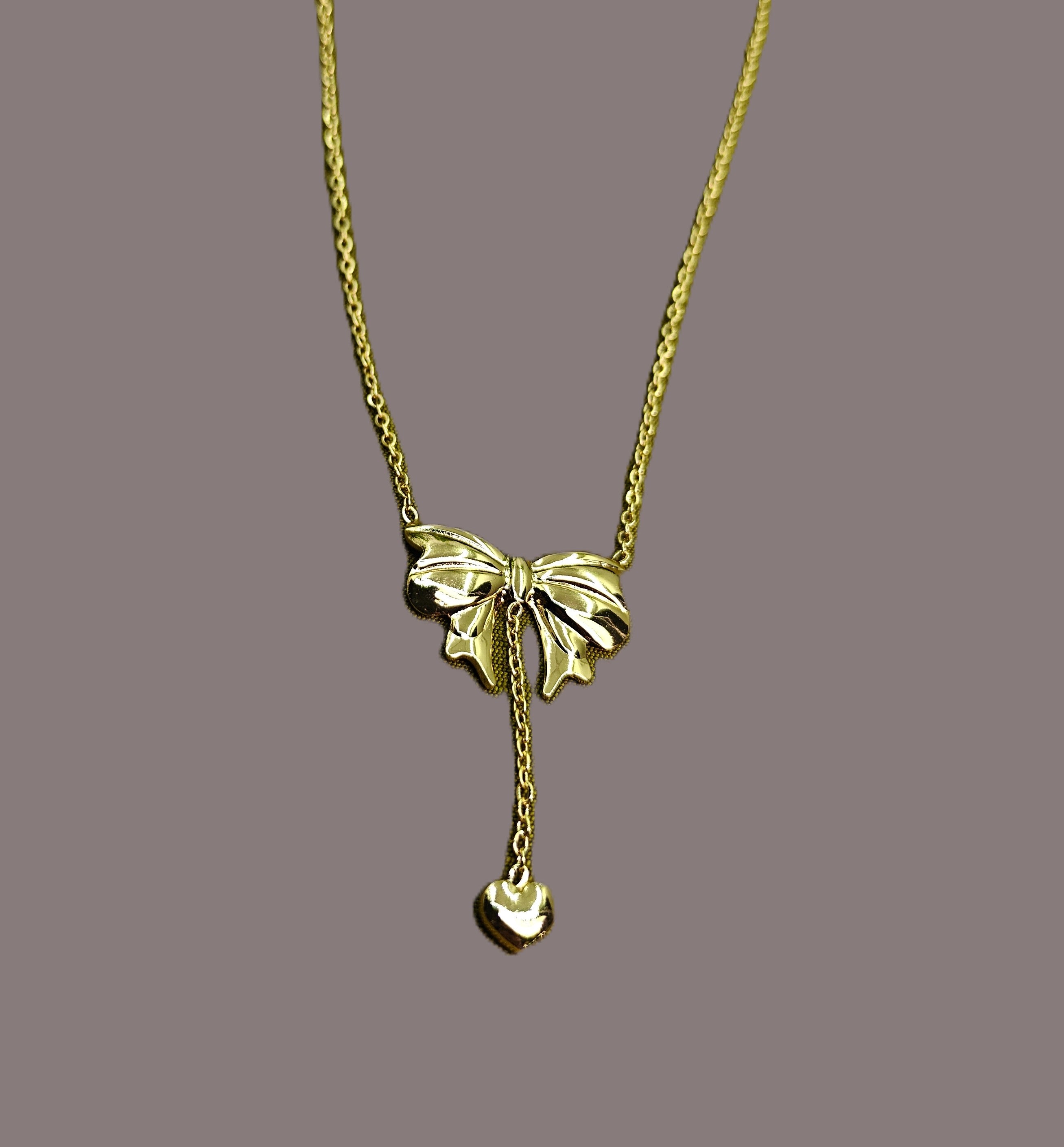 Gold-Tone Bow & Heart Drop Pendant Stainless Steel Necklace for Women - Glossy Finish (24 Inches)