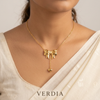 Gold-Tone Bow & Heart Drop Pendant Stainless Steel Necklace for Women - Glossy Finish (24 Inches)